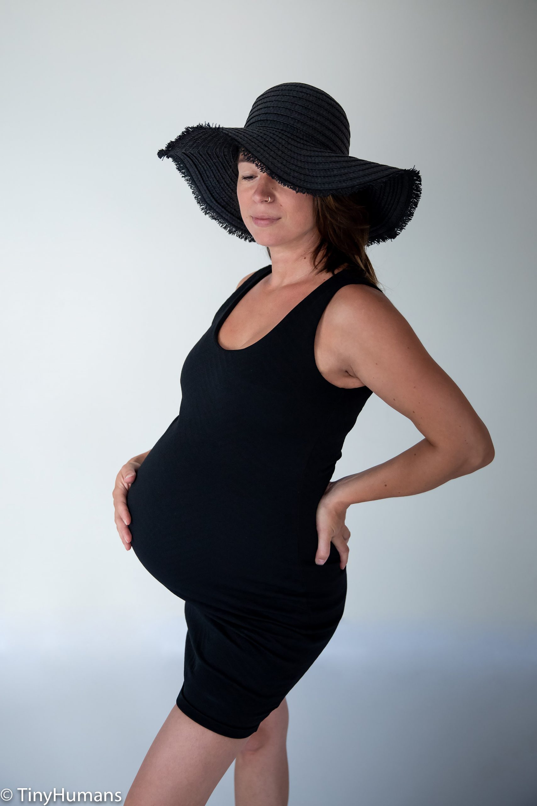 Pregnant woman with a hat